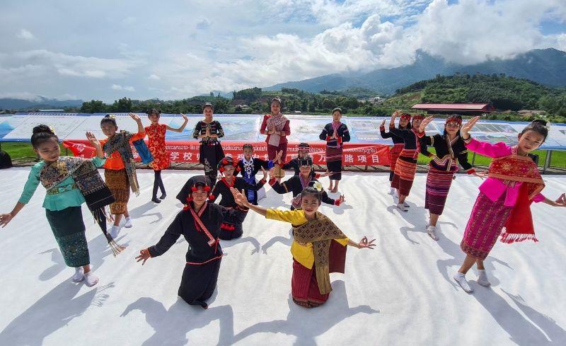 The students perform traditional dance show of Welcome to Laos.